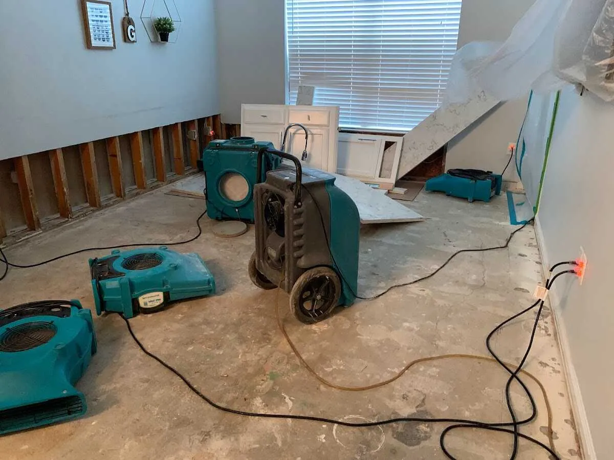 Dehumidifier in flood-cut room for Water Damage Restoration in Guthrie